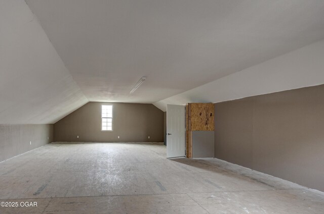bonus room with vaulted ceiling