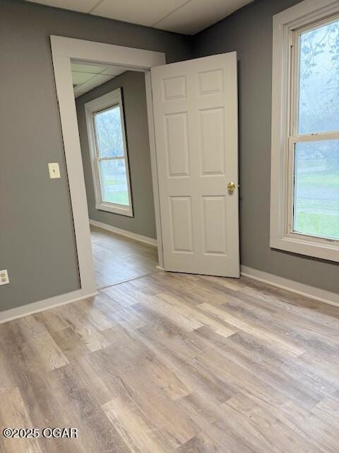 201 N Georgia St, Pittsburg, KS 66762 - spare room with light wood-style flooring and baseboards