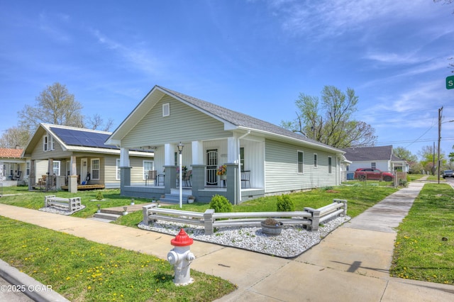1831 Annie Baxter Ave, Joplin, MO 64804 - bungalow-style house featuring a front lawn and covered porch