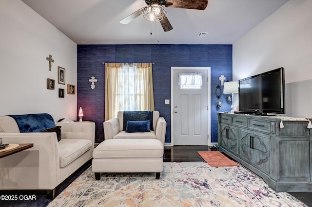 1831 Annie Baxter Ave, Joplin, MO 64804 - living area featuring visible vents, wood finished floors, and ceiling fan