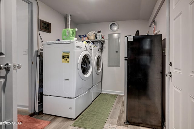 1831 Annie Baxter Ave, Joplin, MO 64804 - laundry room featuring baseboards, washer and dryer, electric panel, laundry area, and light wood finished floors