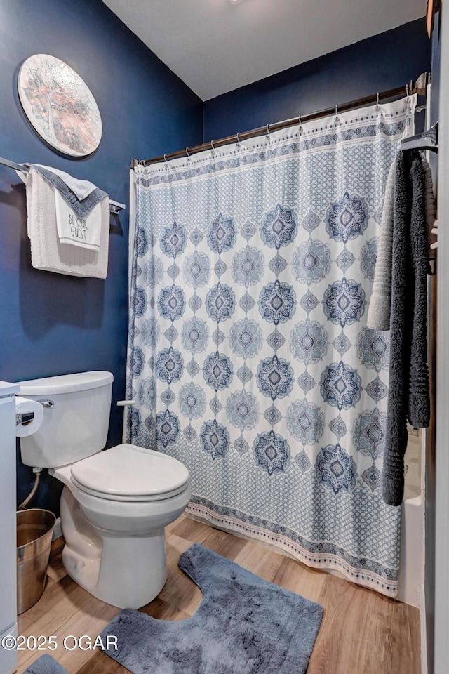 1831 Annie Baxter Ave, Joplin, MO 64804 - full bath with toilet, curtained shower, and wood finished floors