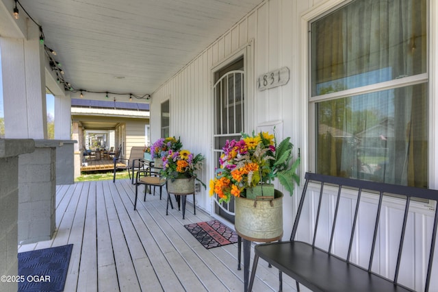 1831 Annie Baxter Ave, Joplin, MO 64804 - wooden terrace with covered porch