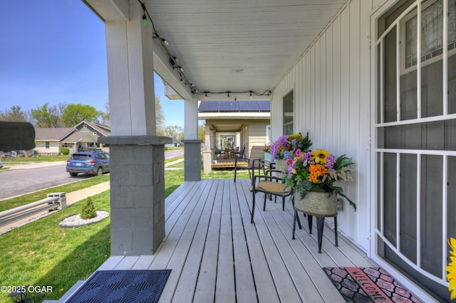 1831 Annie Baxter Ave, Joplin, MO 64804 - deck with a yard and a porch