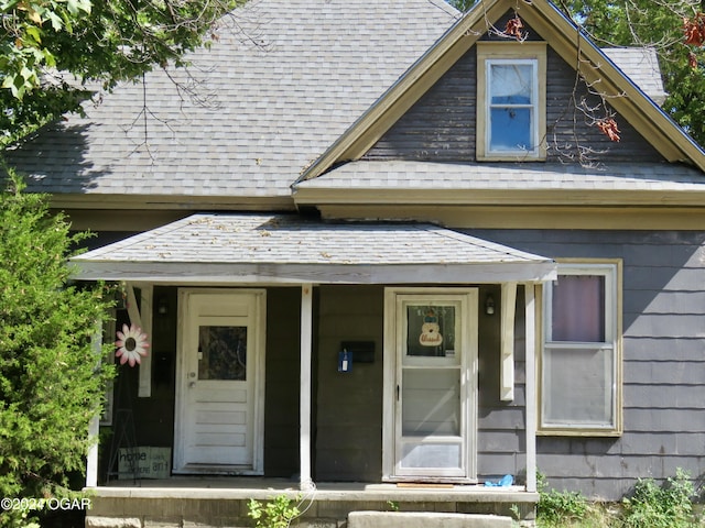 111A-B N Connor Ave, Joplin, MO 64801 - entrance to property with covered porch and roof with shingles