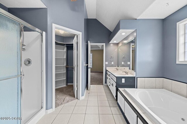 3826 W Randall St, Battlefield, MO 65619 - full bath featuring a shower stall, tile patterned floors, vanity, and lofted ceiling