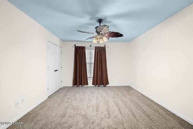 3826 W Randall St, Battlefield, MO 65619 - empty room featuring a textured ceiling, baseboards, and carpet