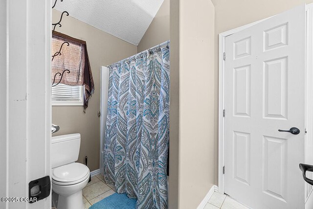 3826 W Randall St, Battlefield, MO 65619 - full bath featuring toilet, tile patterned floors, baseboards, and a textured ceiling