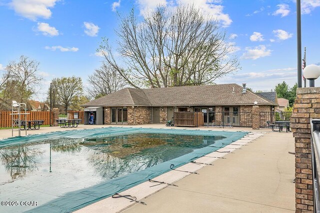 3826 W Randall St, Battlefield, MO 65619 - pool featuring a patio and fence