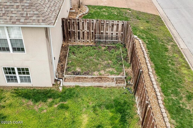 3826 W Randall St, Battlefield, MO 65619 - view of yard with a vegetable garden and fence