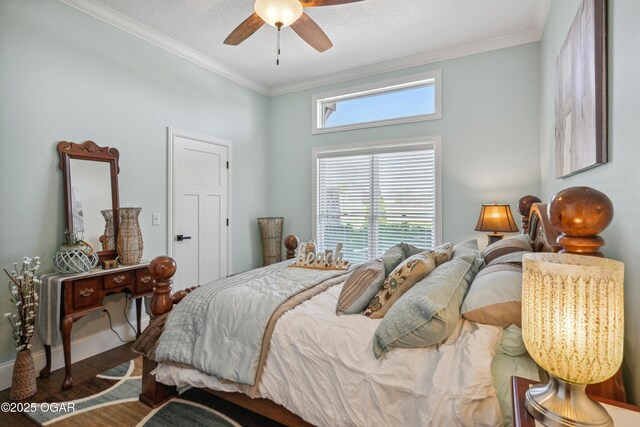 1624 Liam St, Carthage, MO 64836 - bedroom featuring crown molding, ceiling fan, and wood finished floors