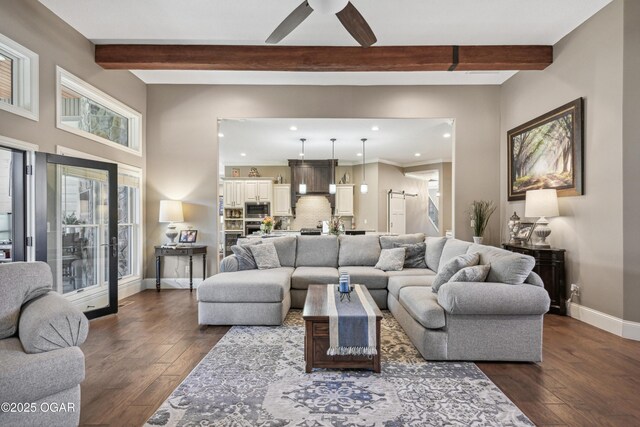 1624 Liam St, Carthage, MO 64836 - living area featuring dark wood-style flooring, beam ceiling, ceiling fan, and recessed lighting