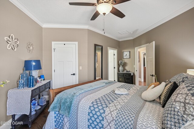 1624 Liam St, Carthage, MO 64836 - bedroom with wood finished floors, ceiling fan, ornamental molding, and visible vents