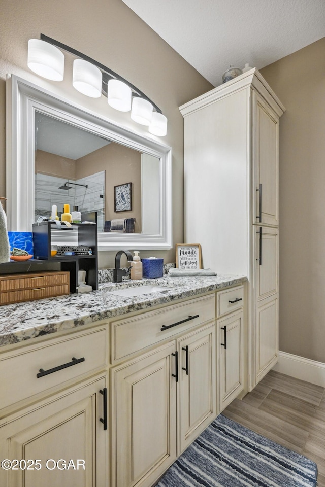1624 Liam St, Carthage, MO 64836 - bathroom featuring baseboards and vanity