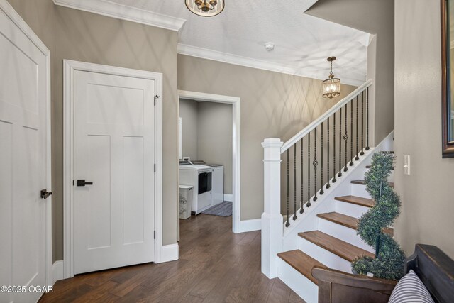1624 Liam St, Carthage, MO 64836 - staircase with washer / dryer, baseboards, crown molding, and wood finished floors