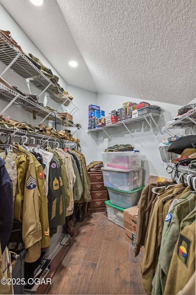 1624 Liam St, Carthage, MO 64836 - walk in closet featuring wood-type flooring and lofted ceiling