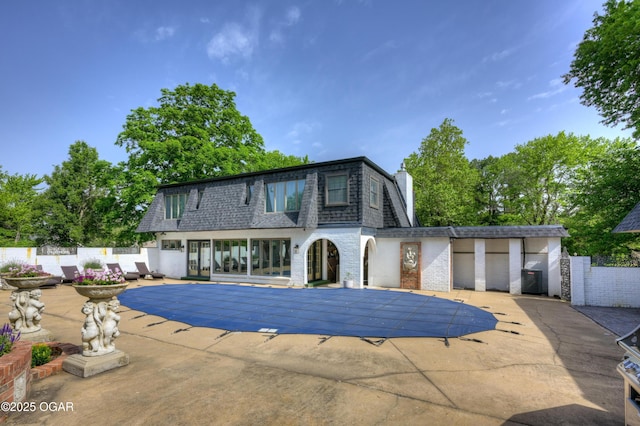 606 Meadowmere Dr, Webb City, MO 64870 - view of swimming pool with a patio