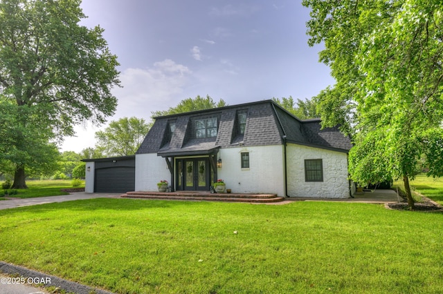 606 Meadowmere Dr, Webb City, MO 64870 - front of property with french doors, driveway, a front lawn, roof with shingles, and an attached garage