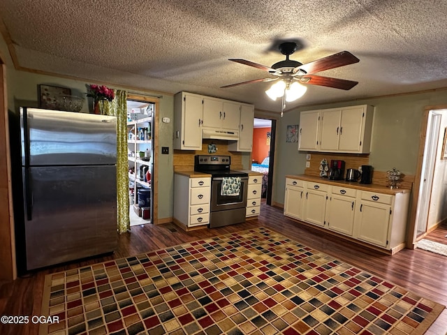 kitchen featuring white cabinetry, appliances with stainless steel finishes, dark wood-style floors, and under cabinet range hood