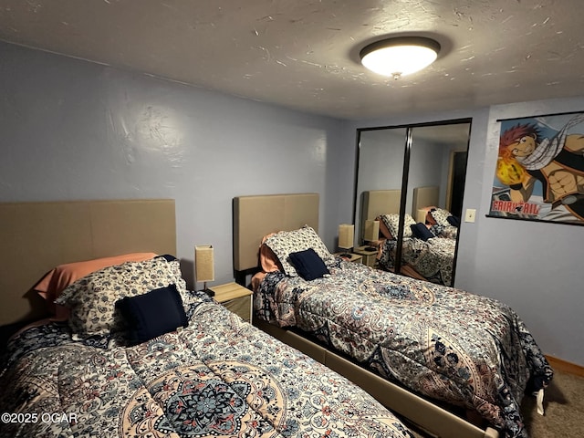 bedroom with a closet and carpet flooring