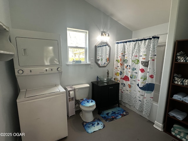 bathroom with toilet, stacked washer / drying machine, concrete flooring, shower / bath combo with shower curtain, and lofted ceiling