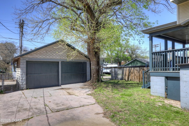 426 N Byers Ave, Joplin, MO 64801 - view of yard with an outbuilding, fence, and a garage