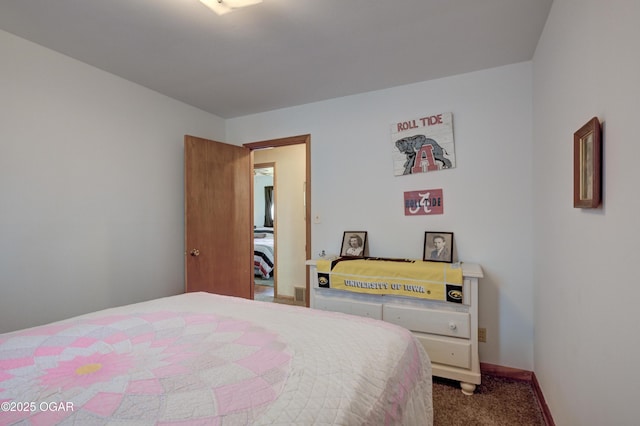 carpeted bedroom with baseboards