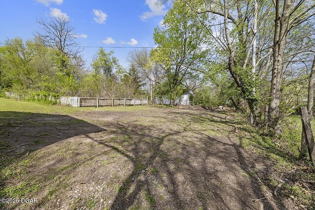 view of yard featuring fence