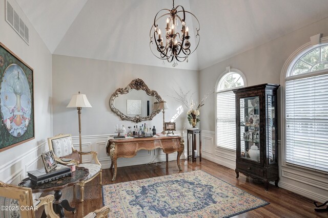 1000 Oakmont Dr, Joplin, MO 64804 - foyer featuring a chandelier, visible vents, wood finished floors, and lofted ceiling