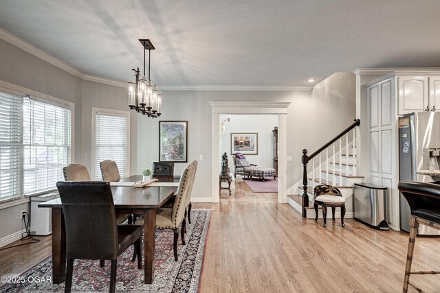 1000 Oakmont Dr, Joplin, MO 64804 - dining space featuring light wood-type flooring, baseboards, and stairway