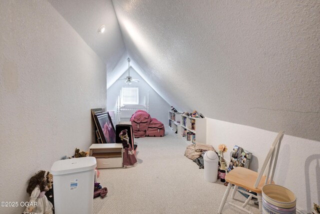 1000 Oakmont Dr, Joplin, MO 64804 - playroom with a textured ceiling, carpet flooring, a textured wall, and lofted ceiling