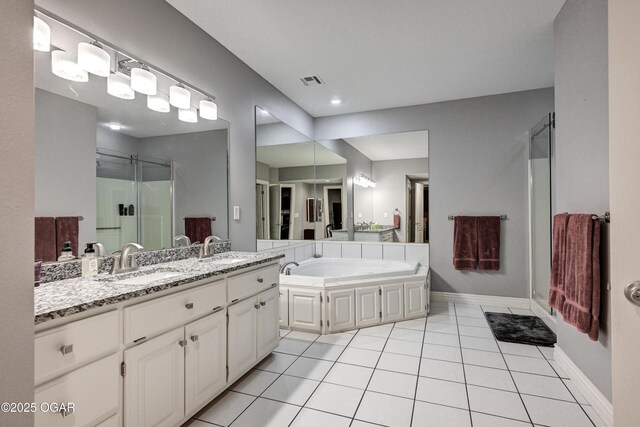 1000 Oakmont Dr, Joplin, MO 64804 - bathroom with visible vents, a bath, tile patterned flooring, vanity, and a stall shower