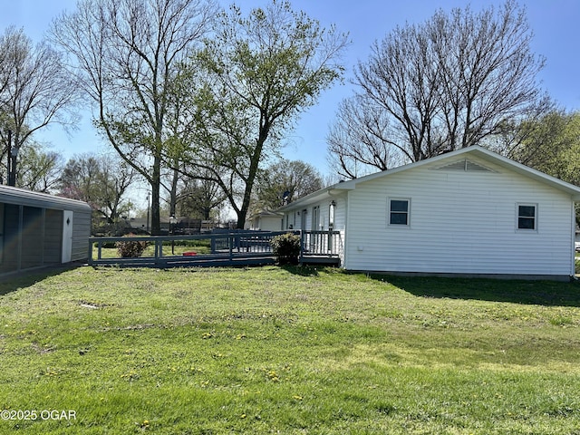 view of yard featuring a deck