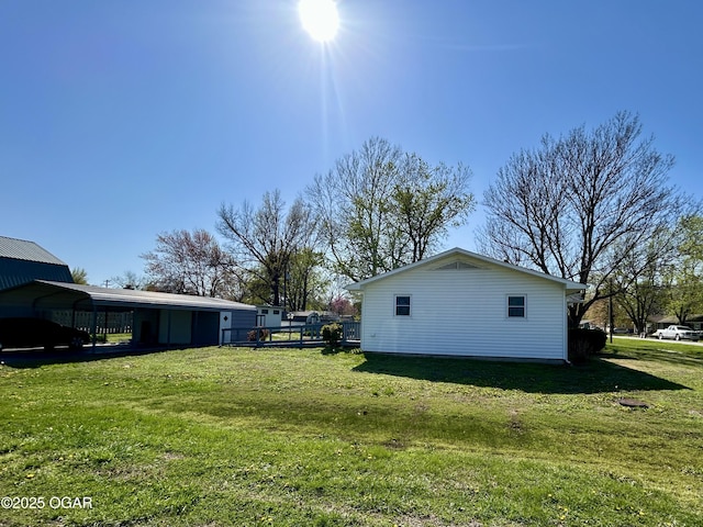 view of yard with a carport