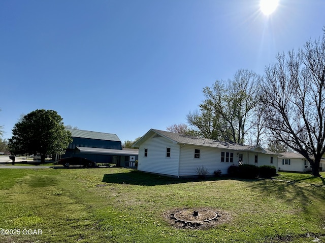 exterior space with a lawn