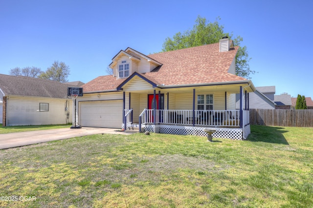 2706 E 26th St, Joplin, MO 64804 - traditional-style house featuring a porch, an attached garage, fence, concrete driveway, and a front lawn