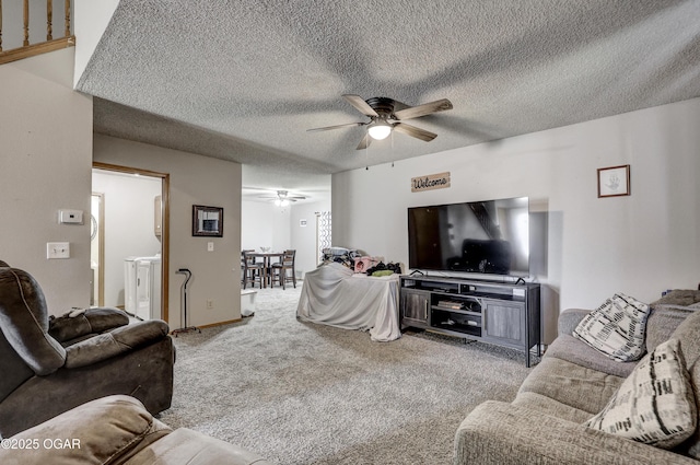 2706 E 26th St, Joplin, MO 64804 - living area with carpet flooring, a textured ceiling, and a ceiling fan