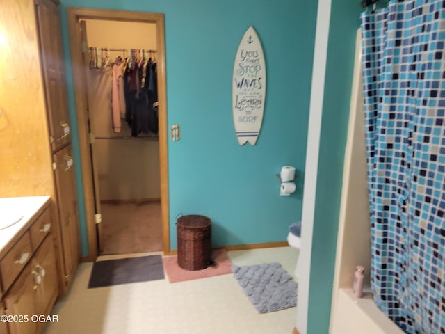 2706 E 26th St, Joplin, MO 64804 - bathroom featuring a shower with shower curtain, vanity, and toilet