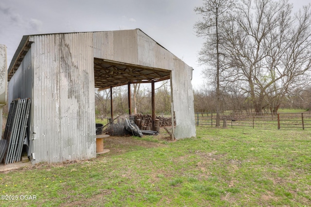 241 SE 40th Rd, Lamar, MO 64759 - view of pole building with a yard and fence