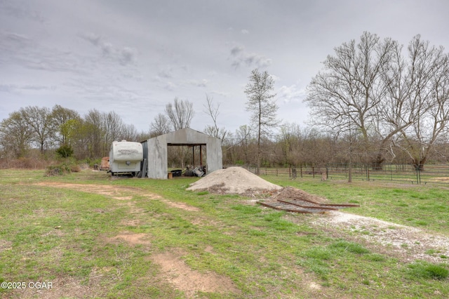 241 SE 40th Rd, Lamar, MO 64759 - view of yard with an outbuilding, a pole building, and fence