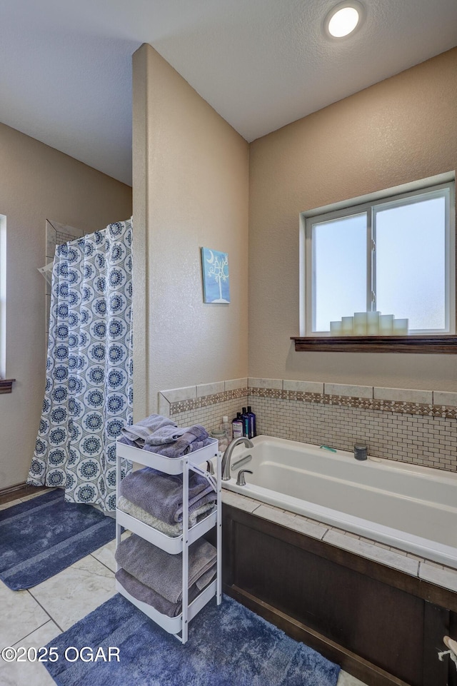 full bathroom with a garden tub and a shower with curtain