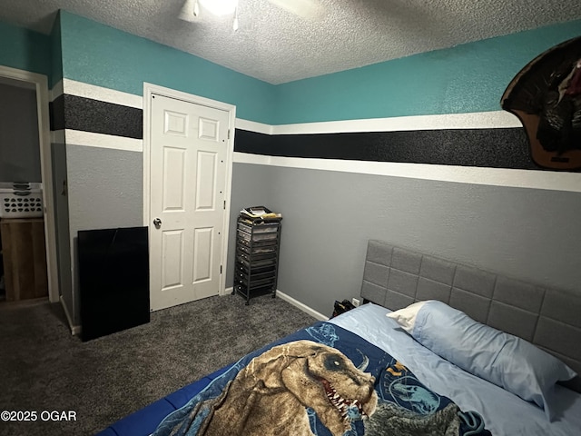 2027 P St SW, Miami, OK 74354 - bedroom with a textured ceiling, a textured wall, and carpet floors
