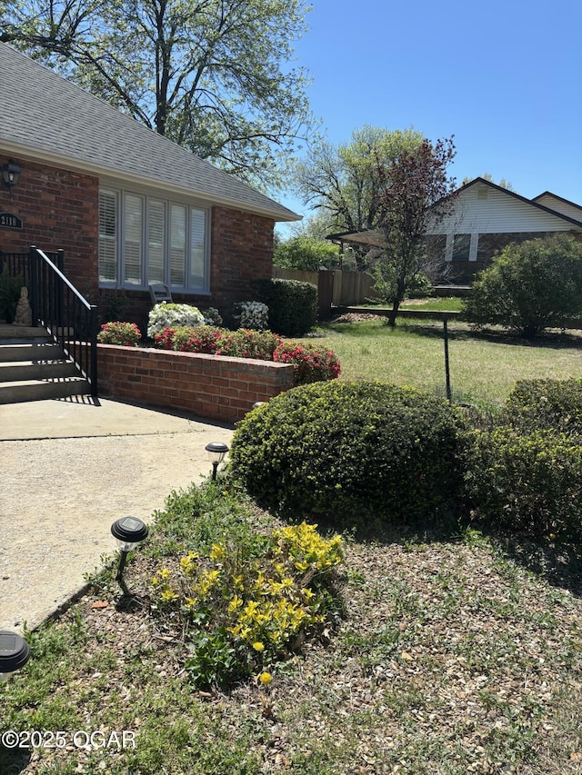 view of yard featuring fence