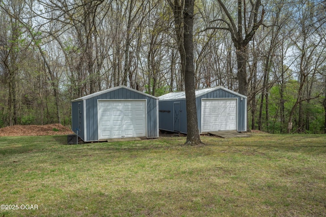 garage featuring a forest view