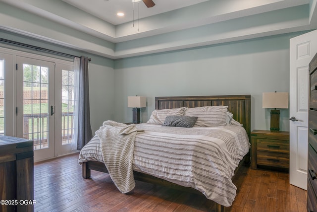 bedroom with dark wood finished floors, recessed lighting, access to exterior, ceiling fan, and french doors