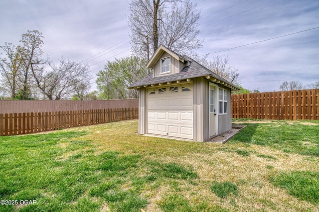 view of outbuilding featuring a fenced backyard and an outdoor structure