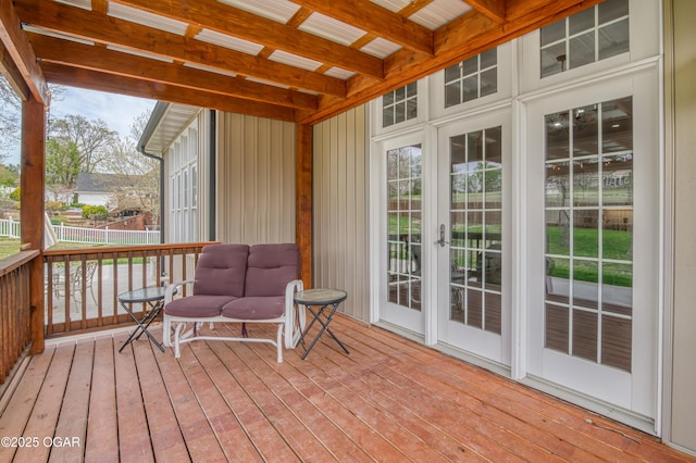 sunroom featuring french doors and plenty of natural light