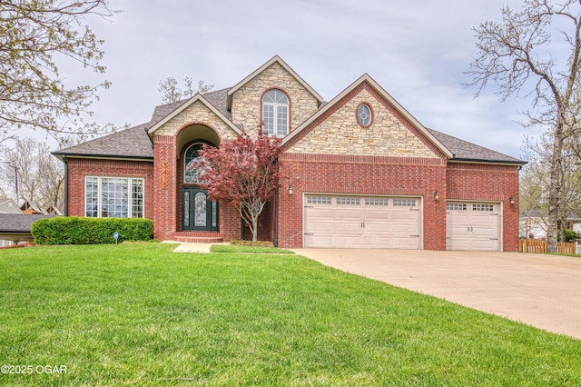 traditional home featuring concrete driveway, a shingled roof, a front yard, brick siding, and a garage