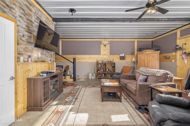 17881 Goldfinch Rd, Neosho, MO 64850 - living area with a ceiling fan and wooden walls