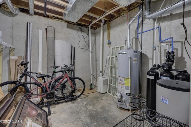 3222 Sunset Dr, Joplin, MO 64804 - unfinished basement featuring gas water heater and a water softener system